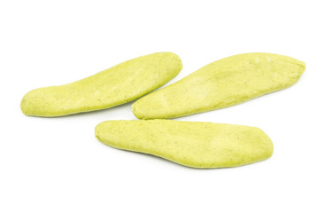 Olive leaves spinach pasta raw isolated on white background three pieces.