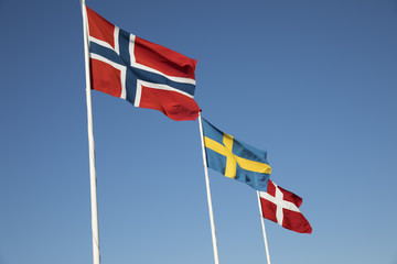 Scandinavian country flags against blue sky, Hornbaek, Kattegat Coast, Zealand, Denmark