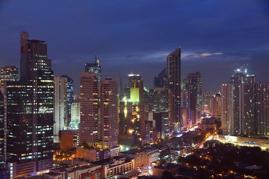 Manila night city. Manila Makati city skyline. © Tupungato