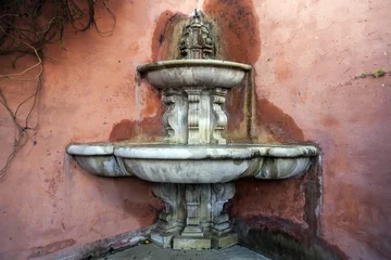 Photo sur Plexiglas Fontaine Artistic fountain in Juderia, jewish quarter of Sevilla, Andalucia, Spain.