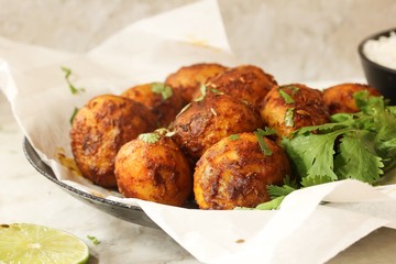Homemade Bombay potatoes close up, selective focus