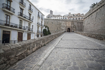 Fototapeta premium Historic center, Gateway, Portal de Ses Taules, main entrance to the walled enclosure of the old town of Ibiza, Balearic Islands.