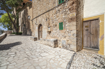 Fototapeta na wymiar Ancient street village view, Deia, Serra de Tramuntana, Mallorca Island, Balearic Islands. Spain.