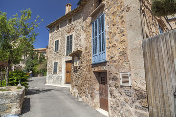 Ancient street village view, Deia, Serra de Tramuntana, Mallorca Island, Balearic Islands. Spain.