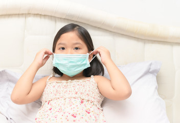 sick girl wear protection mask to protect virus