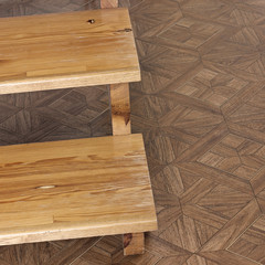 Wooden staircase on the background of a wooden floor. Parquet.