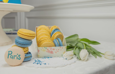 sweet french macaroon on white isolated white background. fly falling sweet macaroni