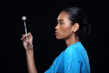 Obraz premium Doctor Nurse in white blue shirt with syringe