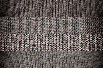 Dark background from a textile material with wicker, close-up fabric texture