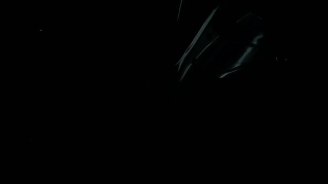 Close up view turned off headlight of sport motorcycle at night.4K