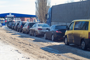 Queue of cars on international checkpoint.