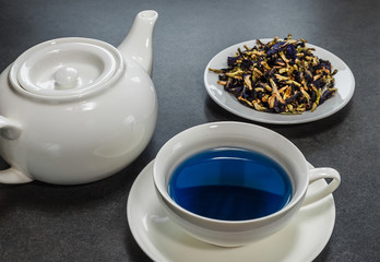 Thai blue tea in a white cup