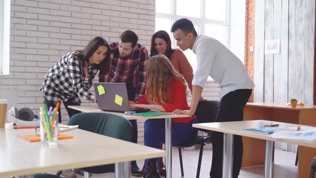 educational class at the university. young students are discussing the assignment in the classroom. 4k