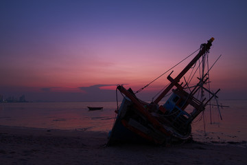 The Wreck was left on the beach with the beautiful twilight sky.