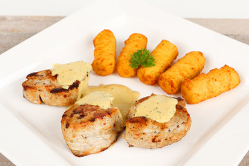 Schweineflilet mit Kroketten