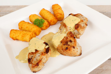 Schweineflilet mit Kroketten