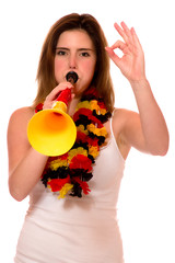 Junge Frau mit Vuvuzela