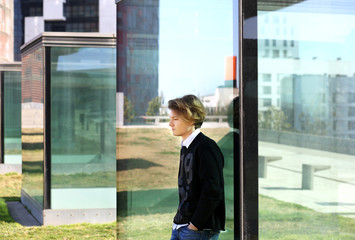 Attractive teenage boy in urban background