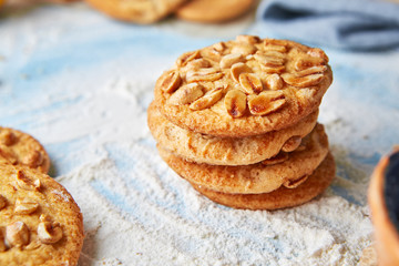 cookies with peanuts on the flour