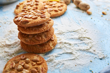 top view of cookies with peanuts on the flour