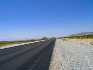 Nevada USA desert highway with black asphalt surface