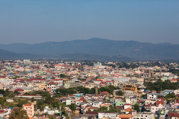 Fototapeta premium A city with nature Surrounded by mountains