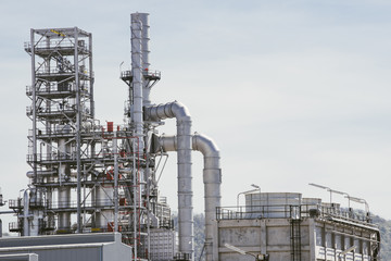 Industrial zone,The equipment of oil refining,Close-up of industrial pipelines of an oil-refinery plant,Detail of oil pipeline with valves in large oil refinery.