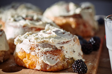 On the table are apetic baking and fresh berries