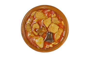 Spanish callos and ingredients on a white blackground