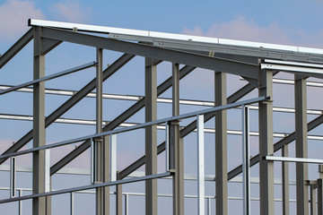 Fototapeta premium Construction of metal structures of the factory shop