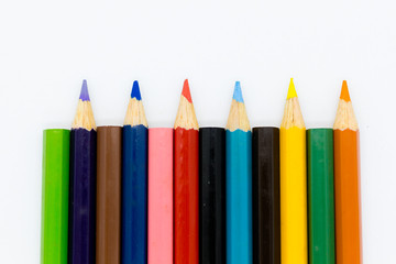 Color pencils on with background. Image use for idea, art concept