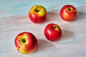 apples on a white wooden table