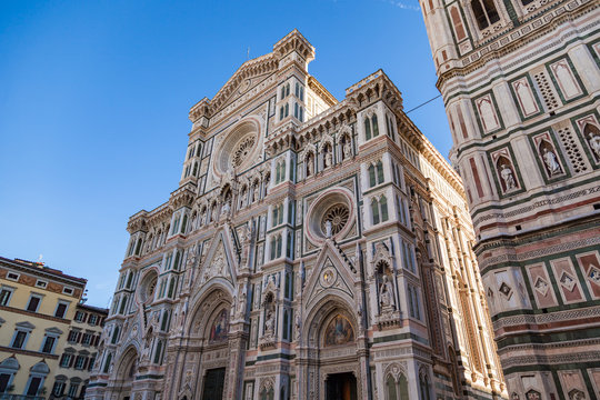 Facade of cathedral of Santa Maria del Fiore on Piazza del Duomo at morning.