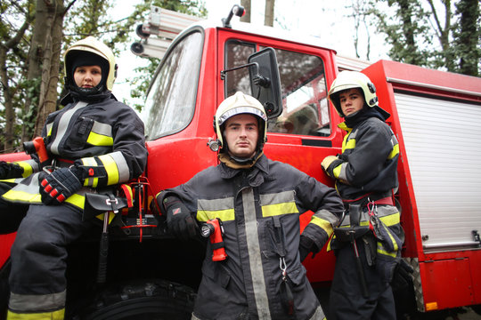 Firemen wearing uniforms