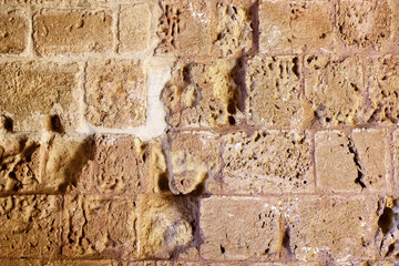 texture of wall from an old badly worked stone
