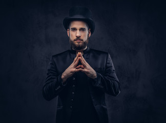 Magician showing trick with playing cards.