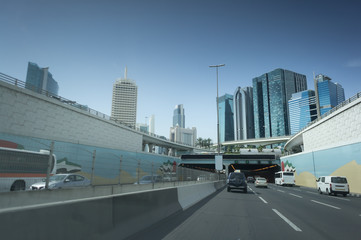 Obraz na płótnie Canvas New asphalt road in a modern city. Cars on the highway