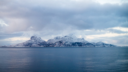 Beautiful snow coverd landscape on a boat to Lofoten