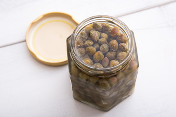 isolated pickled capers