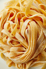 Closeup image of handmade italian tagliatelle pasta