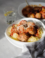 Delicious homemade meat balls in tomato sauce with spaghetti.
