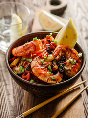 Large grilled BBQ shrimp with sweet chili sauce, green onion and lemon.