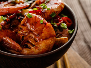 Large grilled BBQ shrimp with sweet chili sauce, green onion and lemon.