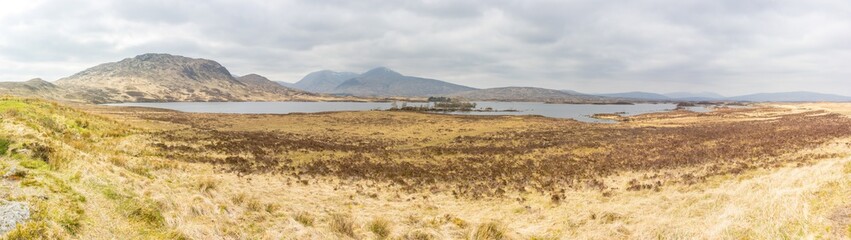 Panoramic shot of Lochan na h-achlaise, Rannoch Moor with Black Mount mountains in the background, Scotland