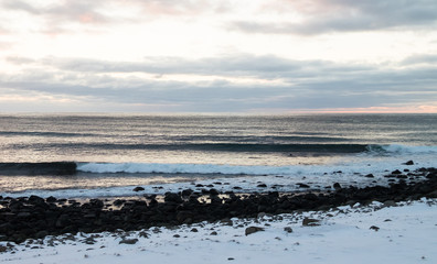 Beautiful sunset and perfect waves in Lofoten, Norway