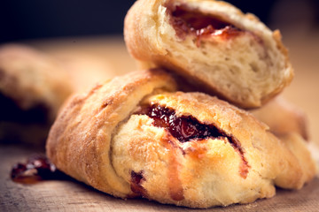 croissants with jam, home baking, shallow depth of field