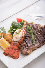 grilled lobster tail and T bone steak