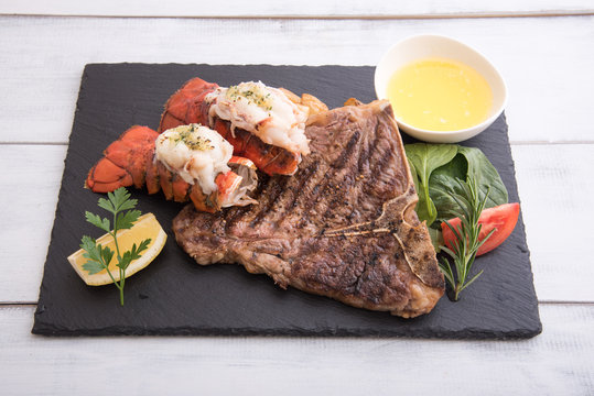 grilled lobster tail and T bone steak