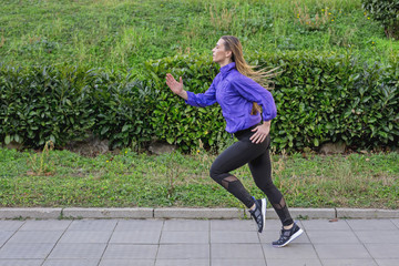 Fitness Girl Running outdoors