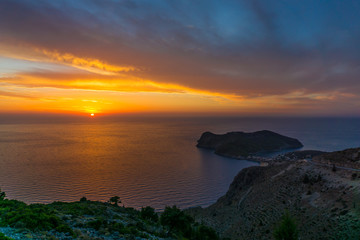 Fototapeta premium Panoramic colorful sunset view in Assos peninsula of Cephalonia Greece